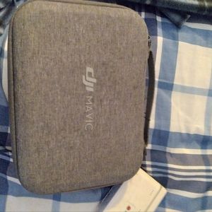 Dji drone plus 4 extra batteries and charging station